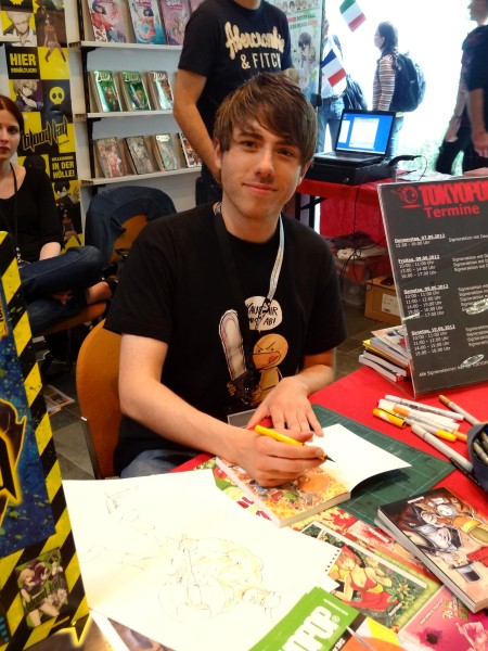 David Füleki am Tokyopop-Stand beim Comic-Salon 2012